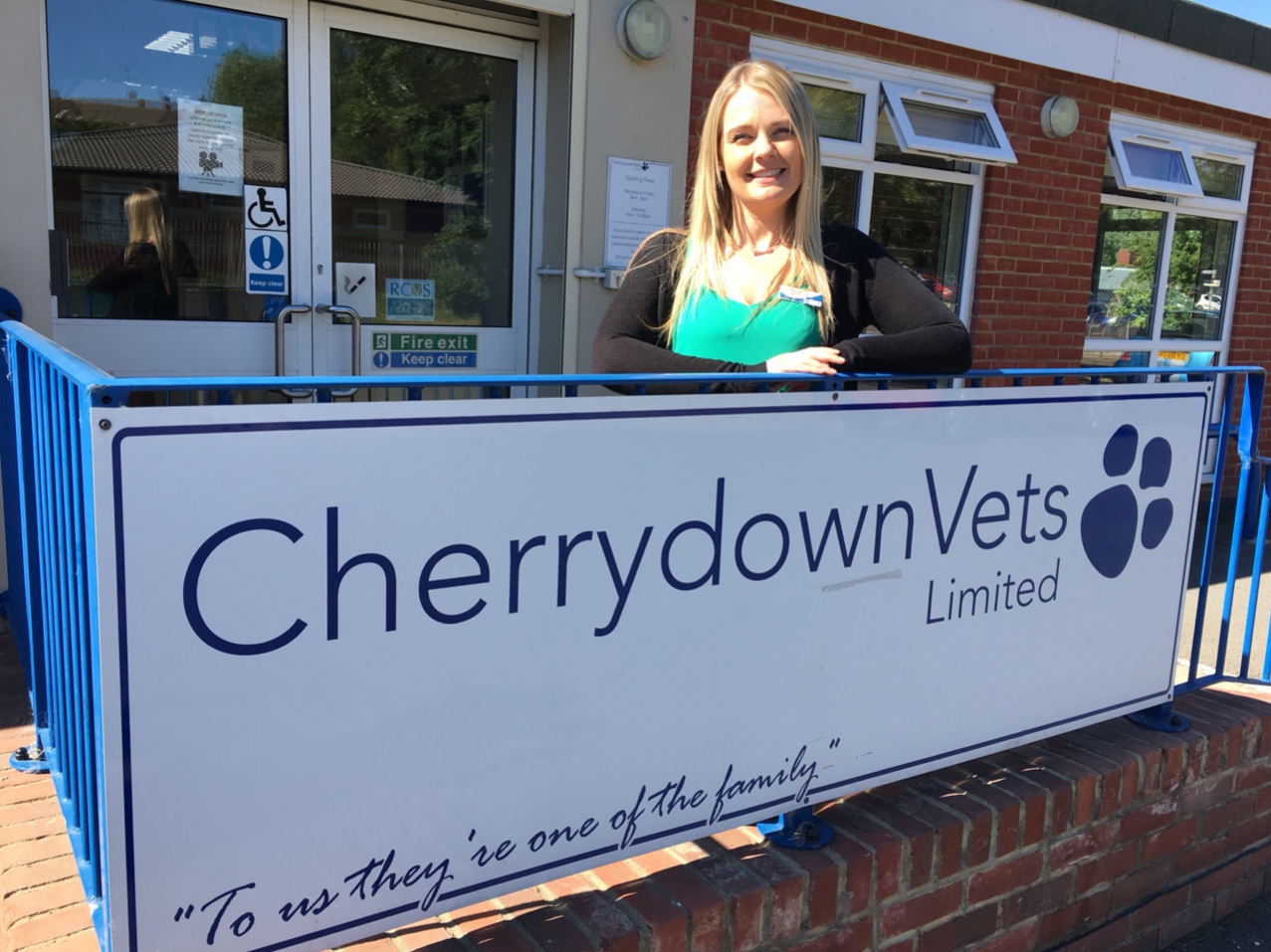 Olivia standing outside Cherrydown Vets